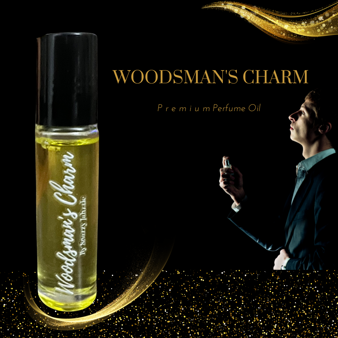 A promotional image for "Woodsman's Charm By Snazzy Jahzzie" premium perfume oil. It shows a roll-on bottle of the Snazzy Jahzzie LLC perfume with the product name on it. To the right, a person in a dark suit is seen spraying the natural allure, with golden sparkles and elegant text emphasizing luxury.